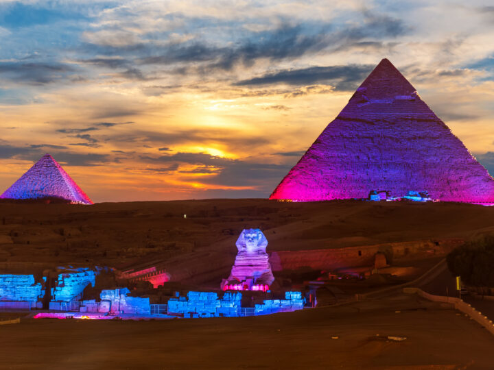 The Great Pyramids of Egypt and the Sphinx, enlighted at night, Giza
