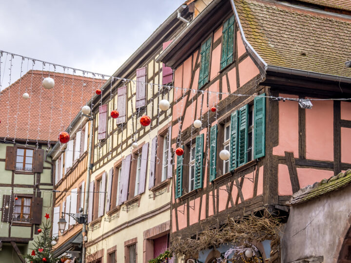 Typical half-timbered houses decorated for Christmas in Riquewihr, Alsace, France
